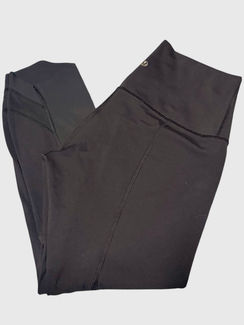 Lululemon black with optional fold over waistband, mesh details & scalloped trim